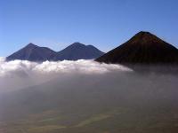 Volcanoes rise above the clouds [Guatemala]